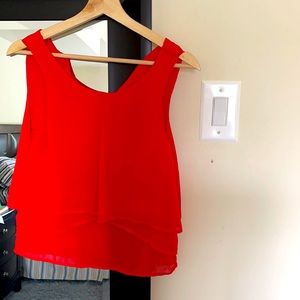 Orange sleeveless blouse
